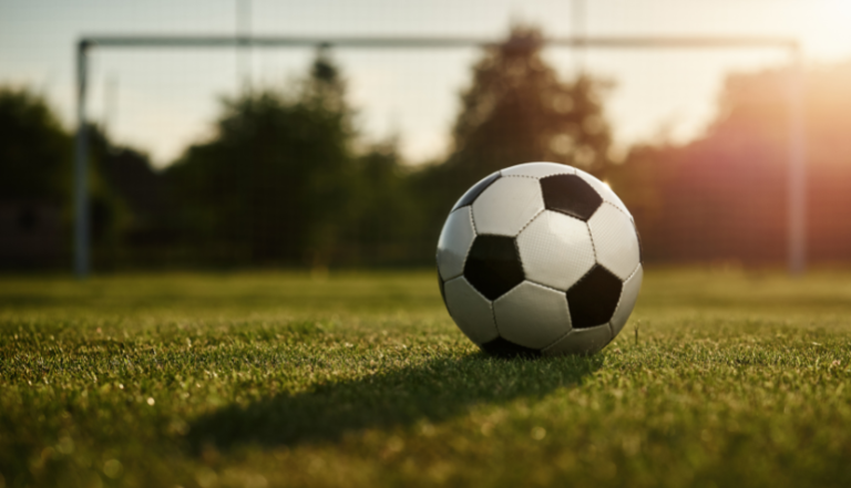 Image: Football on grass