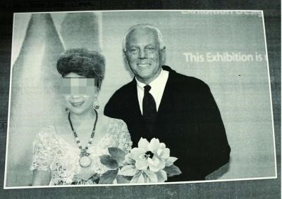 Fig 1. Fake photo of Yang with Giorgio Armani from a news report related to case series.