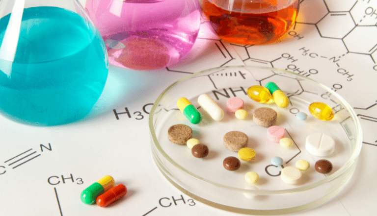 Pills and science flasks photo